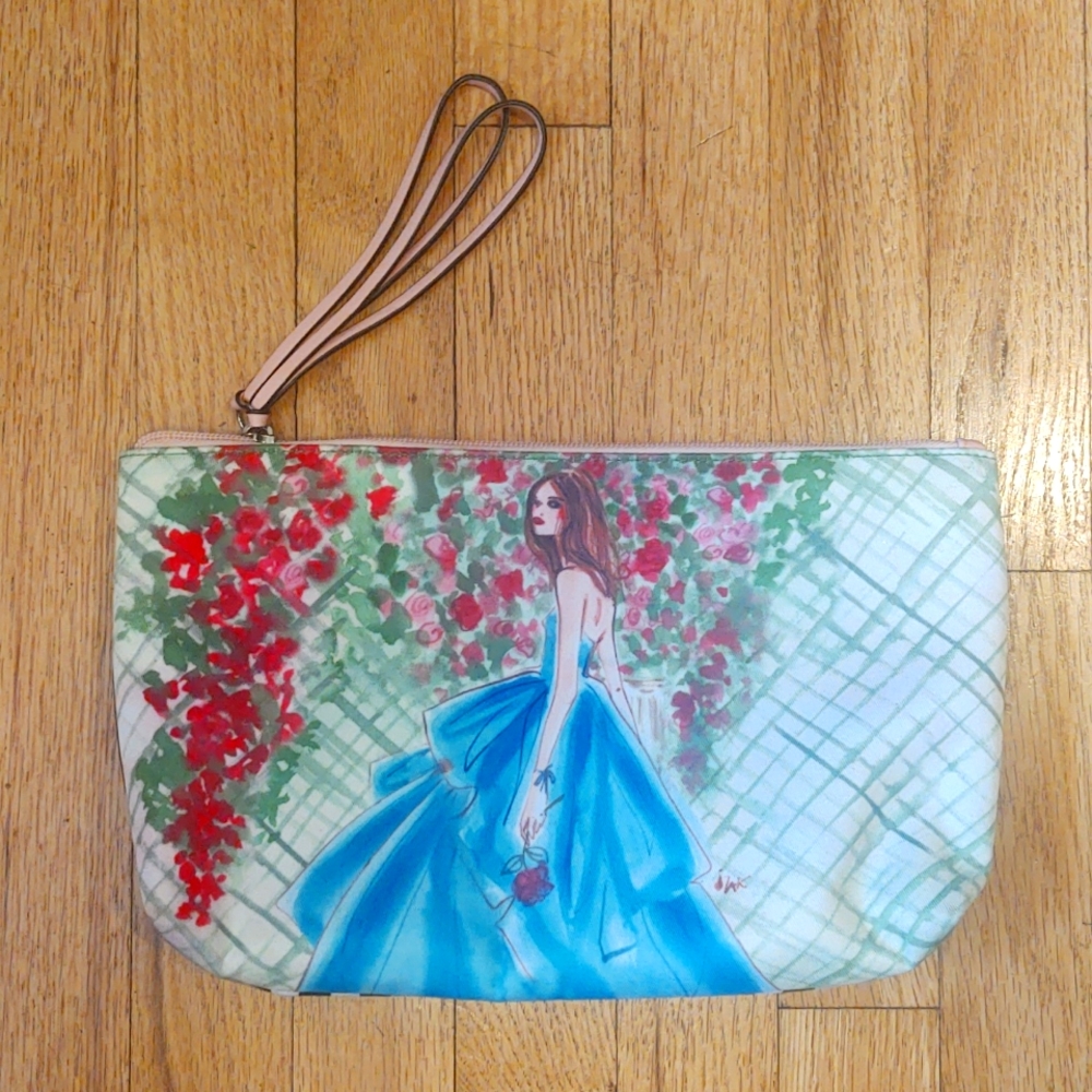 Henri Bendel Lady in blue dress wristlet